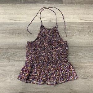 Halter top with a ruffle bottom & includes tag still on it …